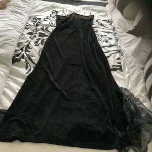 Velvet black halter gown trimmed in gold